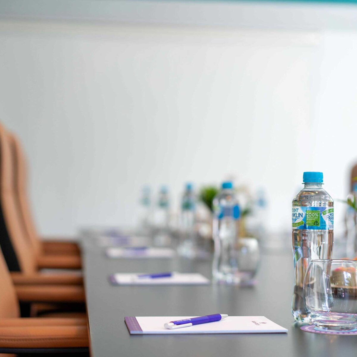 Conference Hall Table and Water Bottle